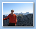 2009-09-08 Pyramiden (11) Me at Pyra. summit and Wilder Kaiser in bg.